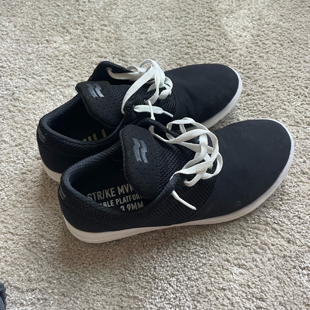 Black and White Athletic Shoes with Classic Silhouette